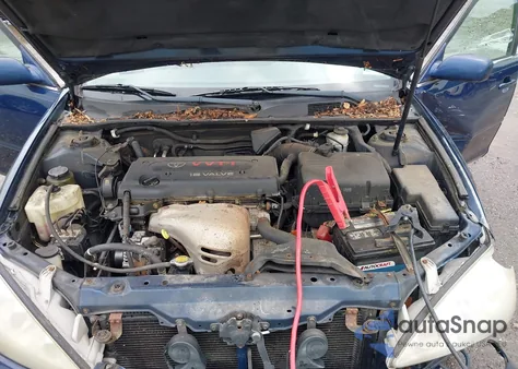 2005 Toyota Camry Le z USA, uszkodzony, nr VIN 4T1BE30KX5U027862